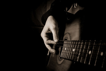 guitar at black background - obrazy, fototapety, plakaty