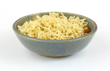 Chili flavored noodles in stoneware bowl