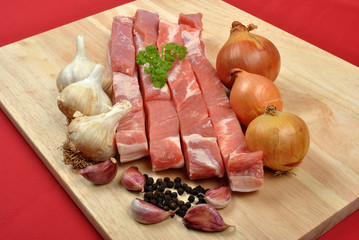 boneless streaky slices on a timber board