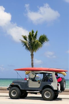 Florida Surfer Car With Surfboard Blue Sky