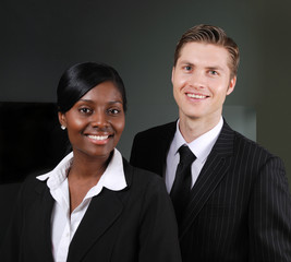 Confident multi-ethnic business couple