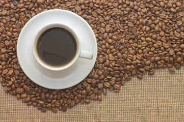 Cup from coffee on coffee grains