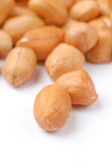 peeled peanut close up or macro with white background