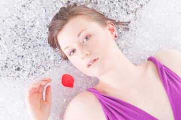 Redhead in ice with rose petal