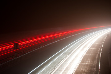 Light trails on a foggy motorway