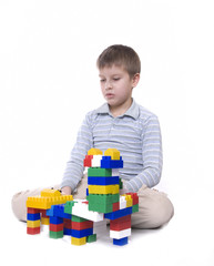 child with toy blocks