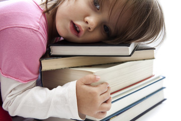 Little girl with books