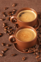 Cups of coffee and beans