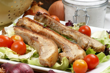 boneless streaky slices with salad and tomato