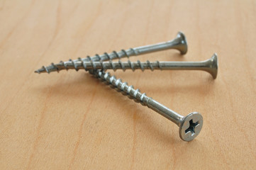 Three Galvanized Deck Screws