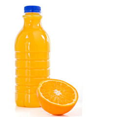 Orange slice and a bottle of fresh orange juice