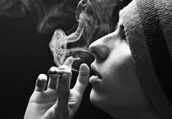 Boy smokes