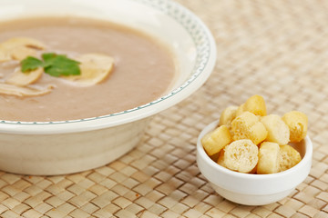 Cream of mushroom soup and bread croutons