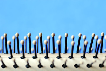 Close up view of a hair brush isolated on blue