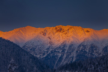 Fototapeta premium Beautiful sunrise in the mountains in winter