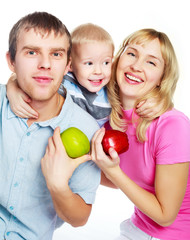 Fototapeta na wymiar family eating apples