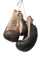 Old boxing gloves hanging on a lace - 20113679