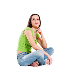 thoughtful young woman looking up