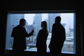 Businesspeople Looking Out the Window