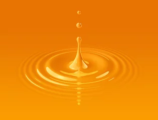 Photo sur Aluminium Jus drop of orange juice and ripple