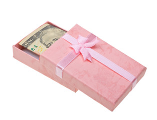 Beautiful pink gift with money anknotes isolated on white