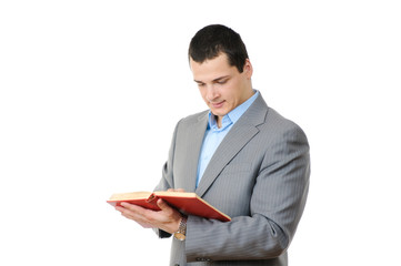 Young man holding book isolated on white background