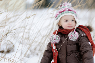 Little baby girl at winter