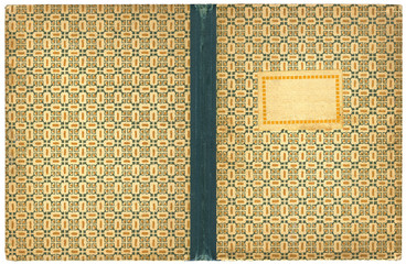 Vintage open book or notebook cover with abstract tapestry and empty label - isolated on white