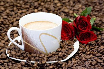 cup of coffee and red roses