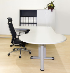 Simple workplace in modern office