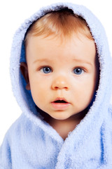 One baby child with blue eyes isolated on white