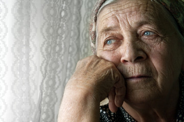 Fototapeta Sad lonely pensive old senior woman obraz