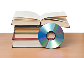 open book  and DVD disk as symbols of old and new methods of inf