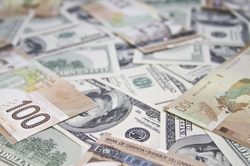 American and Canadian dollars background