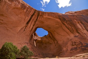 Bowtie Arch, a pothole arch from pothole broken through, Moab