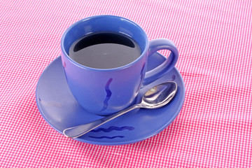 Blue cup of tea on the the table
