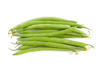 raw long green beans over white background