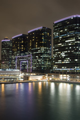 Obraz na płótnie Canvas Hong Kong at night with highrise buildings.