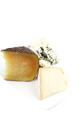 delicatessen chesses on white porcelain