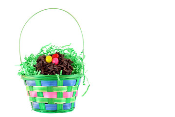 Fototapeta na wymiar Colorful Easter Basket on white background with copy space.