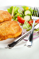 Fried pork chop with vegetables