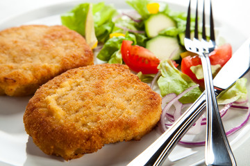 Fried pork chop with vegetables
