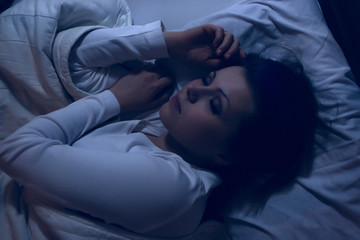 woman sleeping on Bed