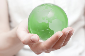 earth globe in hand