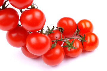 Cherry tomatoes on white background