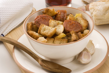 Spanish cuisine. Croutons shepherd's style.