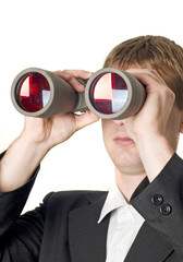 Fototapeta na wymiar Businessman with binoculars searching