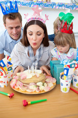 Brunette mother celebrating her birthday