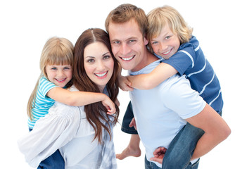 Portrait of family enjoying piggyback ride