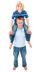 Fototapeta premium Portrait of father giving his son piggyback ride